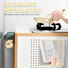 Clear drawer storage box with organized spices and seasonings